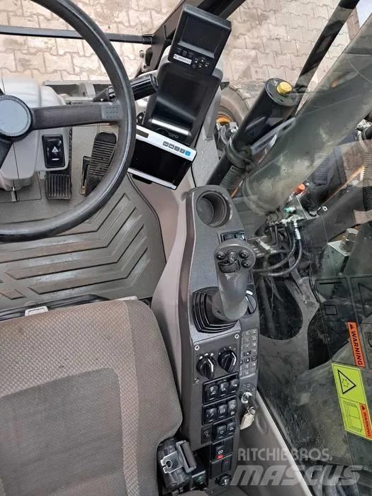 Volvo EW 140 D حفارات بعجل