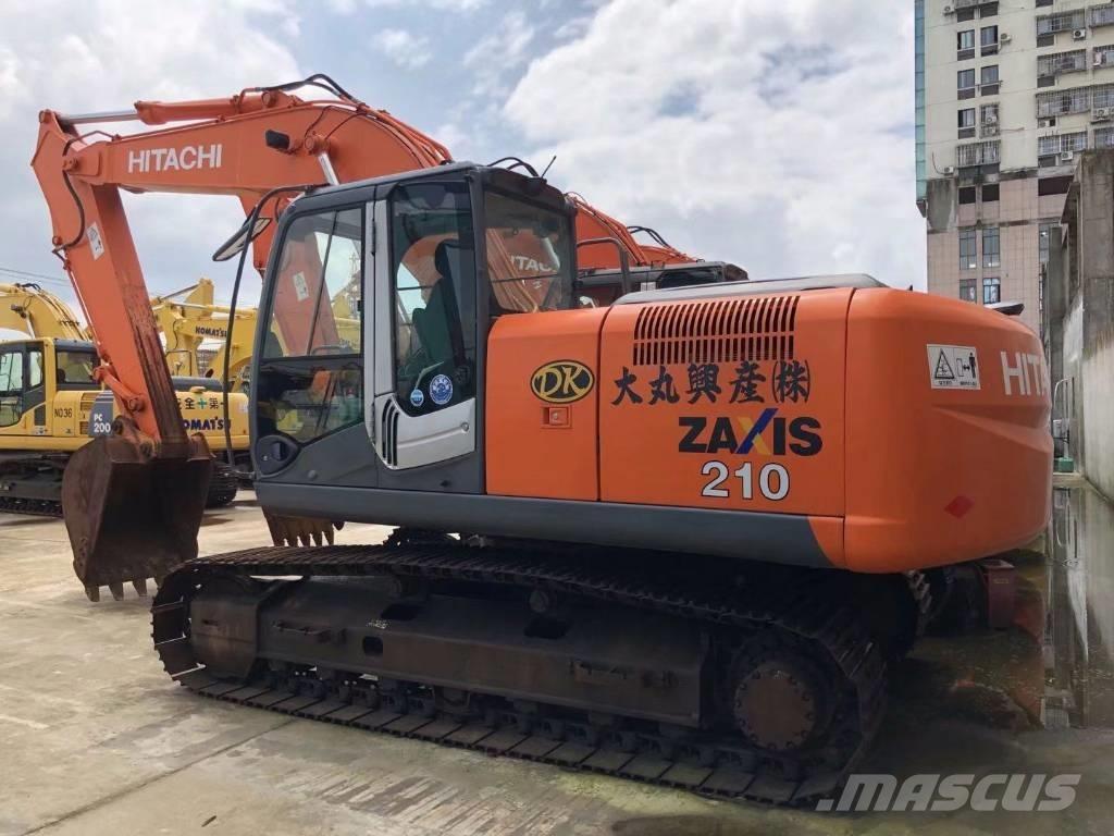 Hitachi zx210 حفارات زحافة