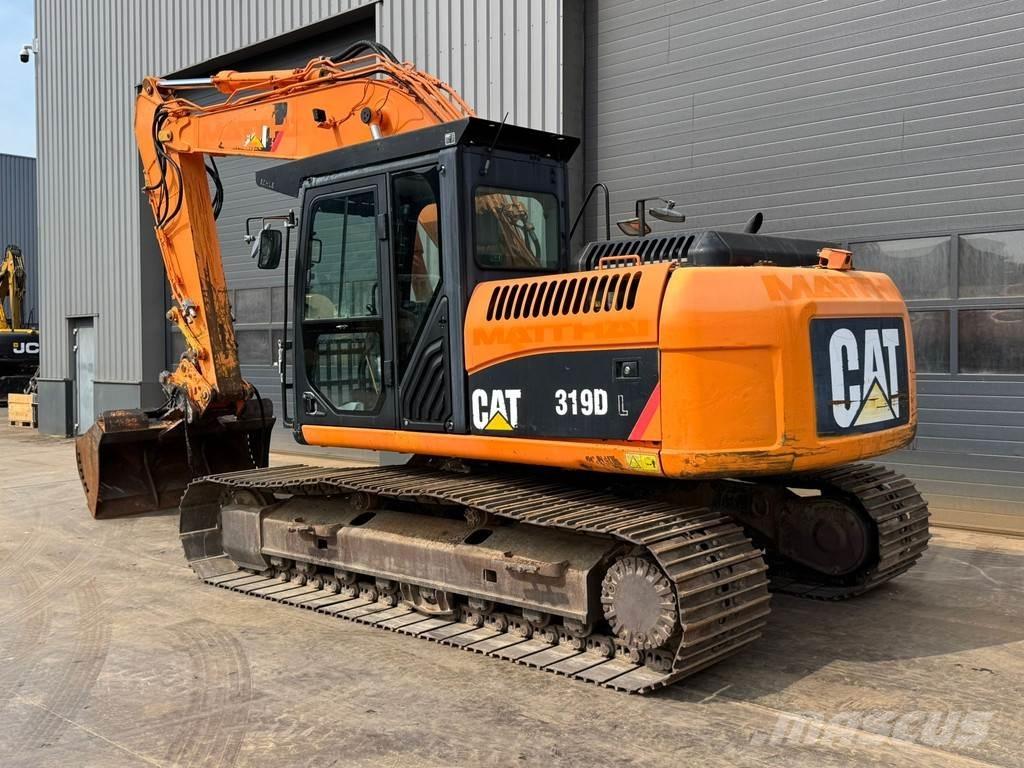 CAT 319DL حفارات زحافة