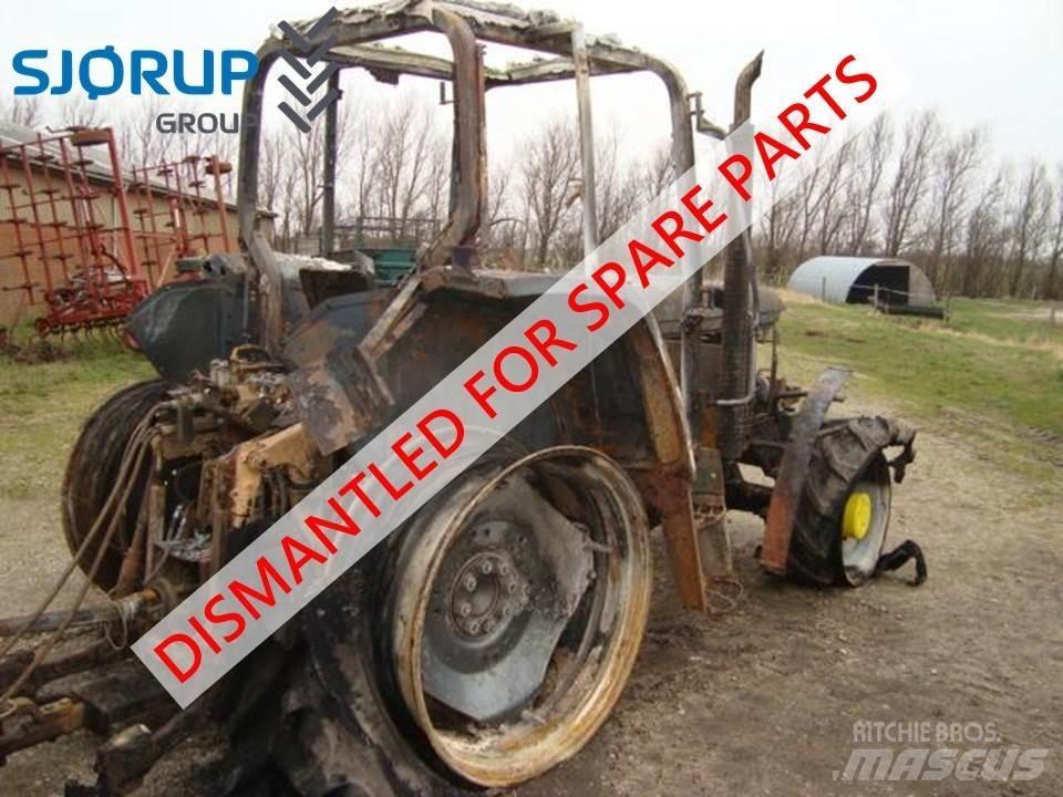 John Deere 6400 الجرارات