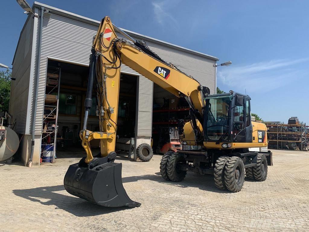 CAT M 316 D حفارات بعجل