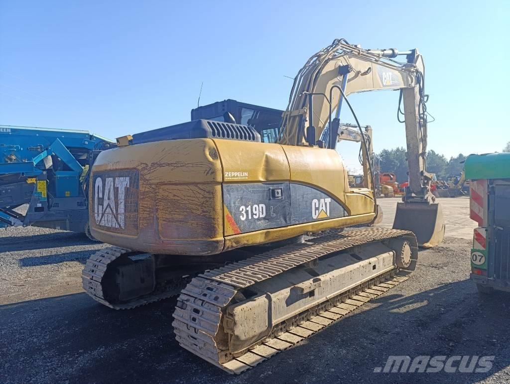 CAT 319 D L حفارات زحافة