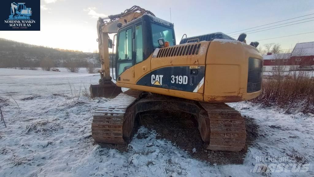CAT 319 D L حفارات زحافة