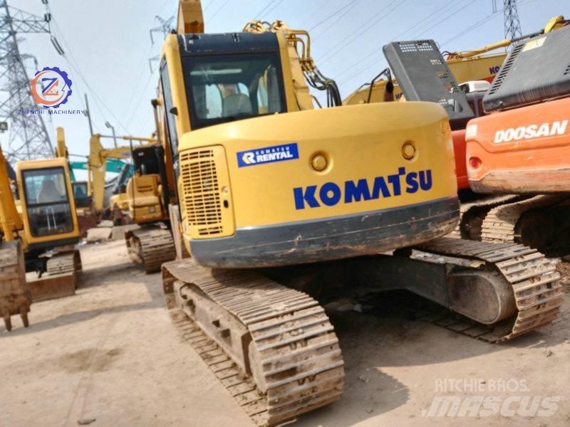 Komatsu PC 128 US حفارات وسط 7 طن - 12 طن