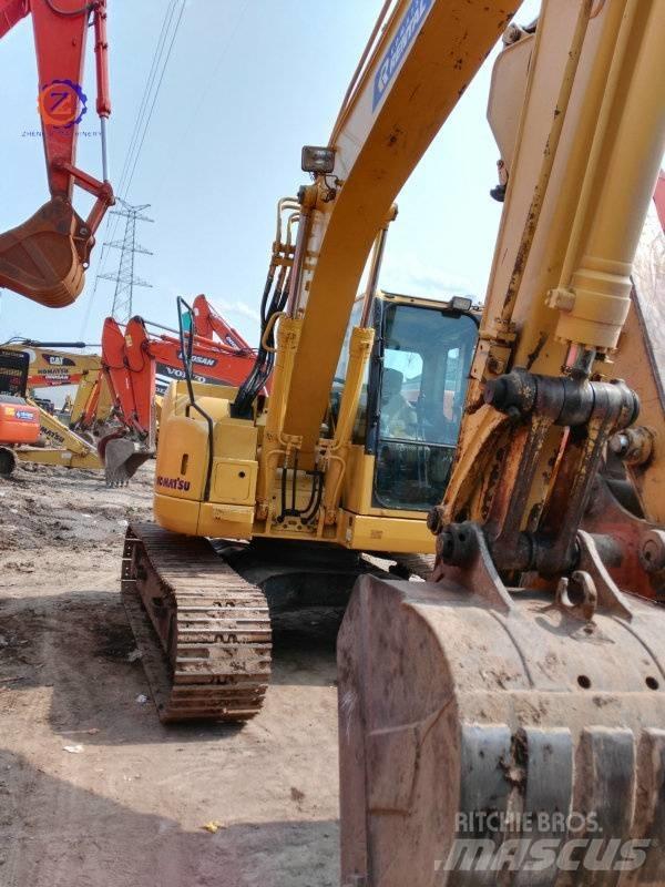 Komatsu PC 128 US حفارات وسط 7 طن - 12 طن