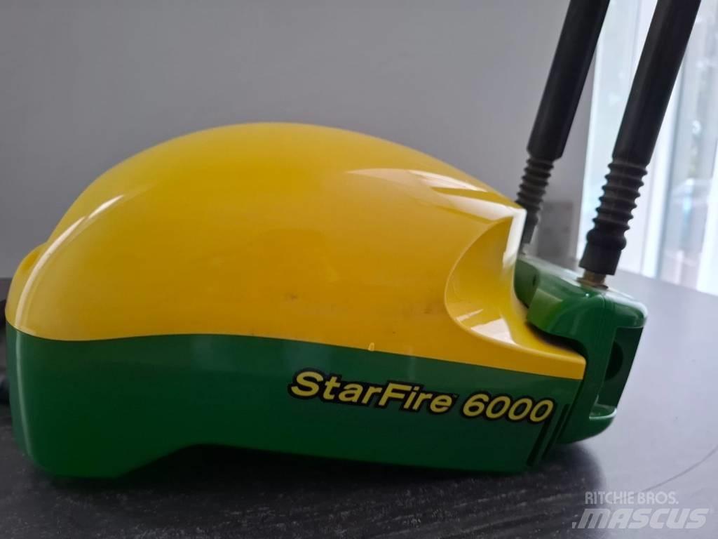 John Deere 8370 R الجرارات