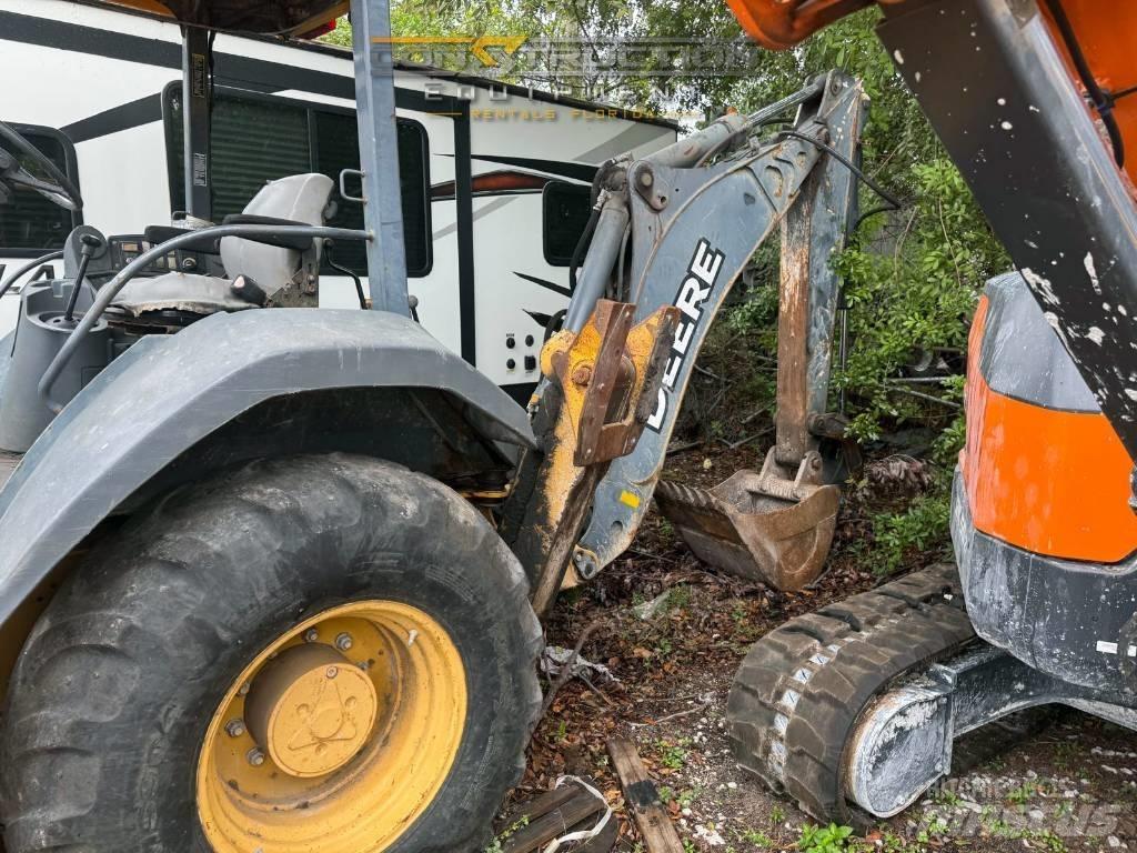 DEERE 310J لوادر ذات جرافات عكسية