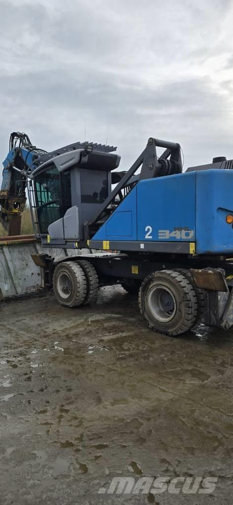 Fuchs F340 F QC لوادر بعجل