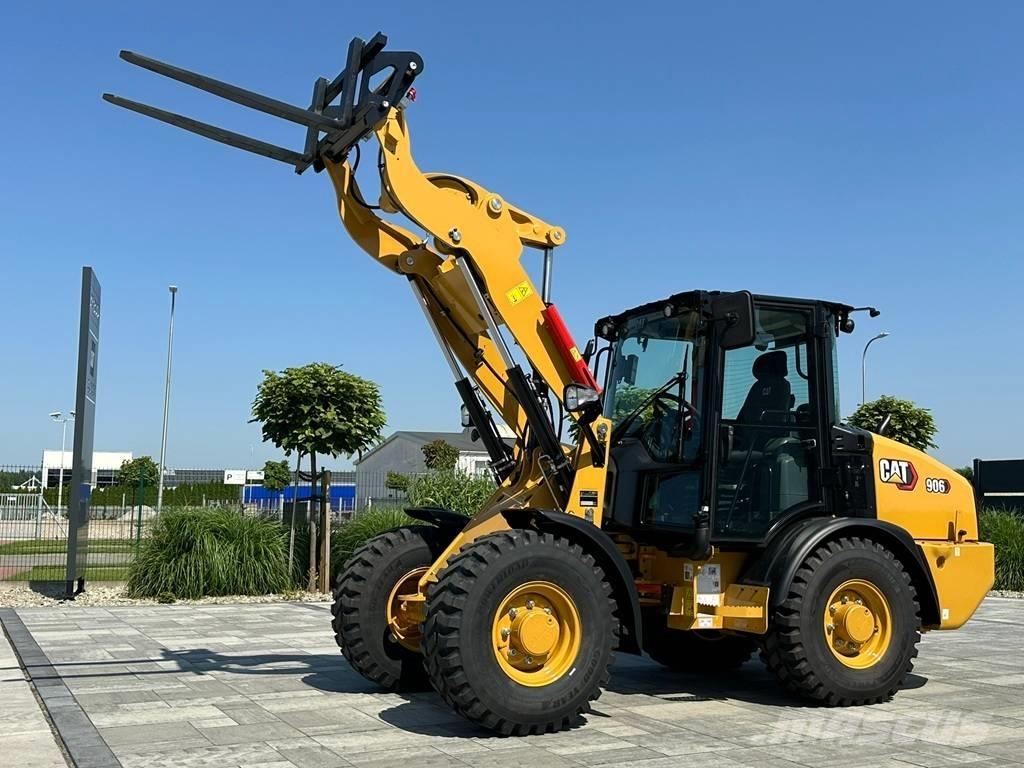 CAT 906 لوادر بعجل