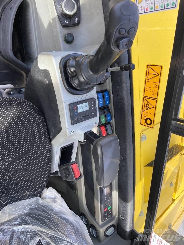 Wacker Neuson EW 100 حفارات بعجل