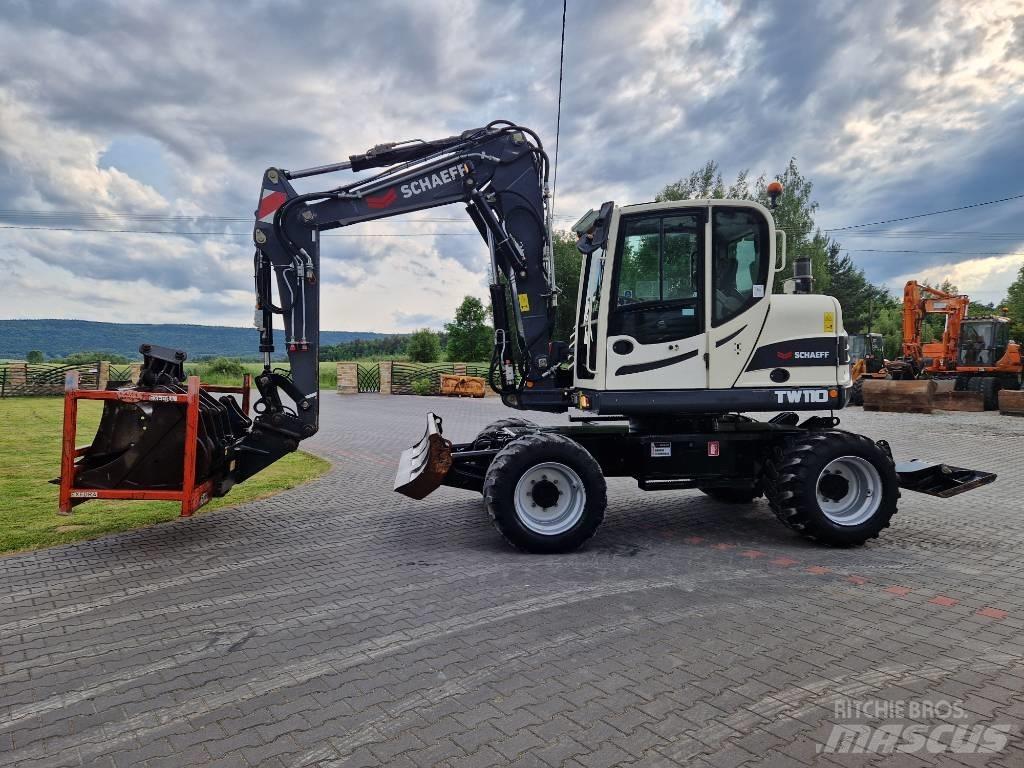 Schaeff TW 110 حفارات بعجل