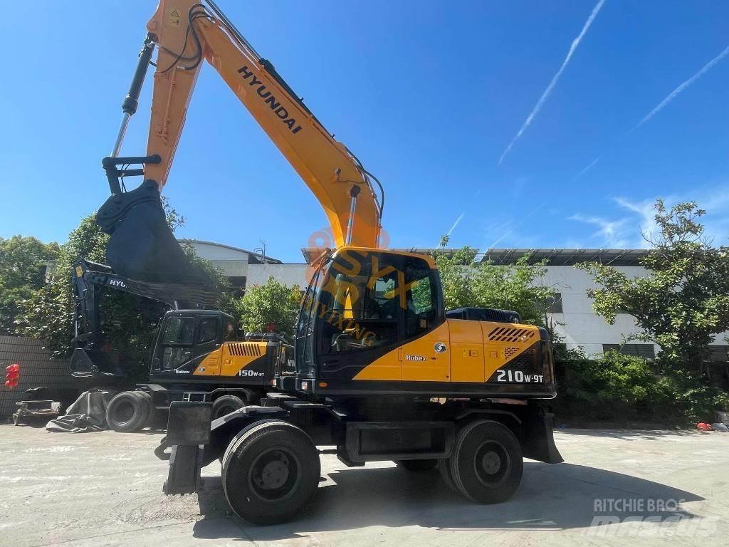 Hyundai Robex 210W-9 حفارات بعجل