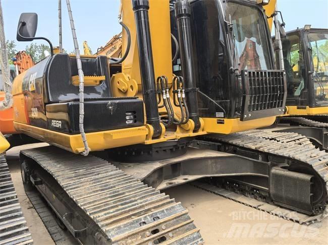 CAT 329 D L حفارات زحافة
