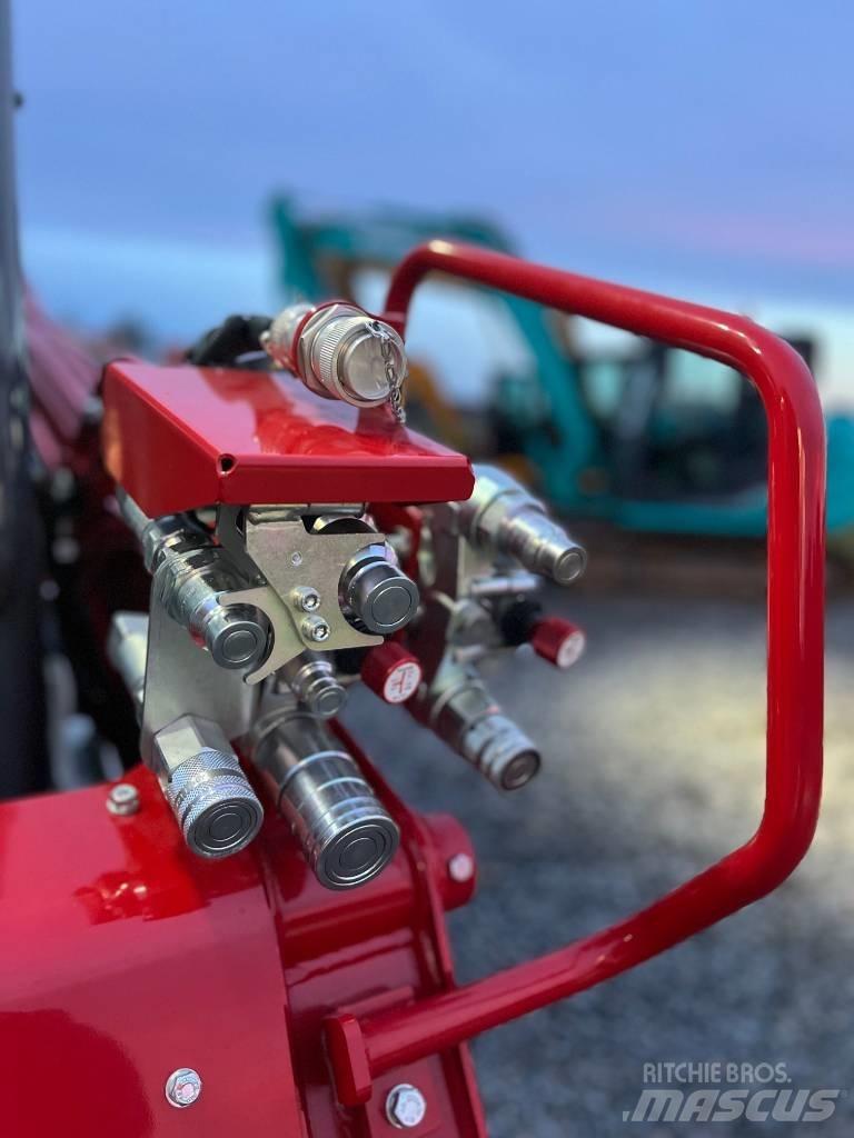 Takeuchi TL12 V2 لوادر انزلاقية التوجيه