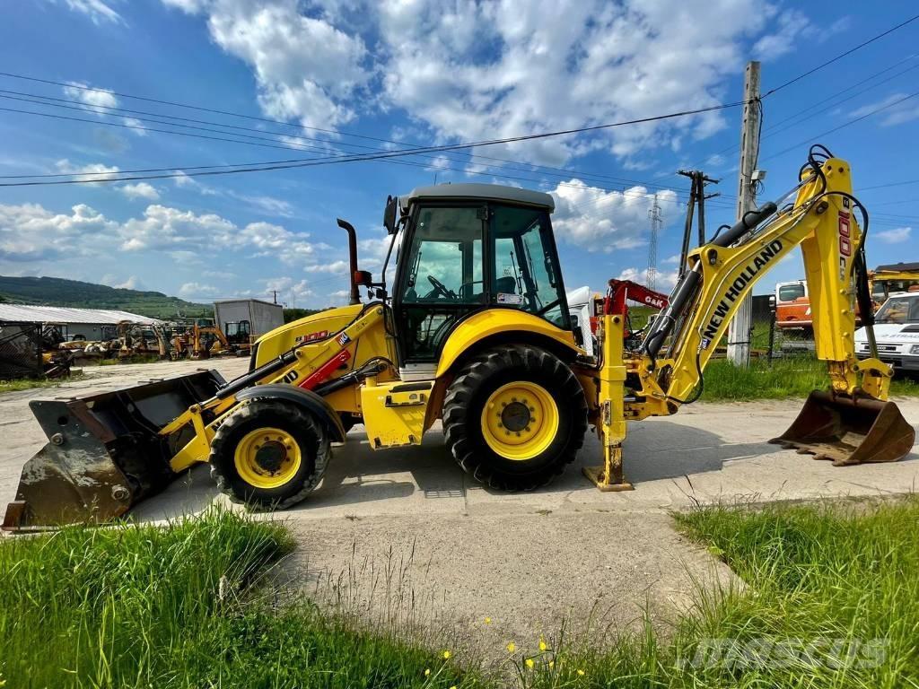 New Holland B 100 C لوادر ذات جرافات عكسية