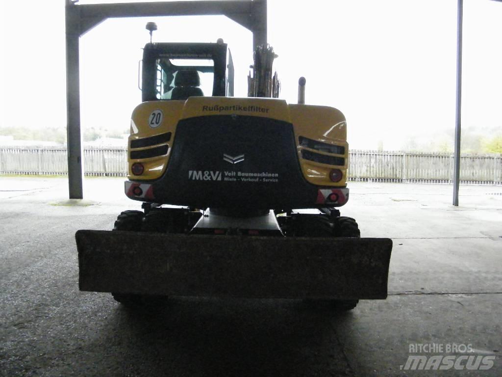 Yanmar B95W حفارات بعجل