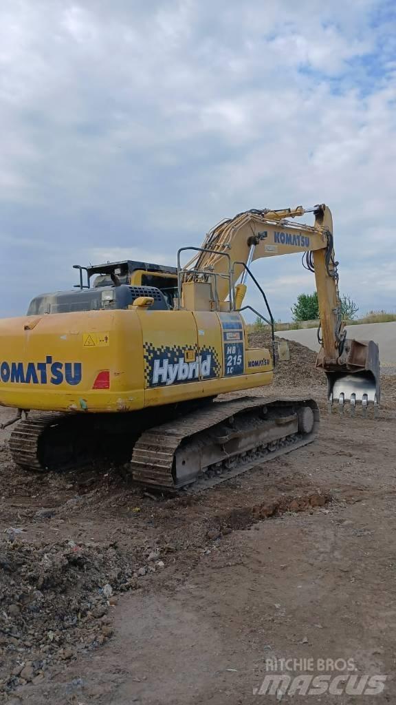 Komatsu HB 215 LC حفارات زحافة