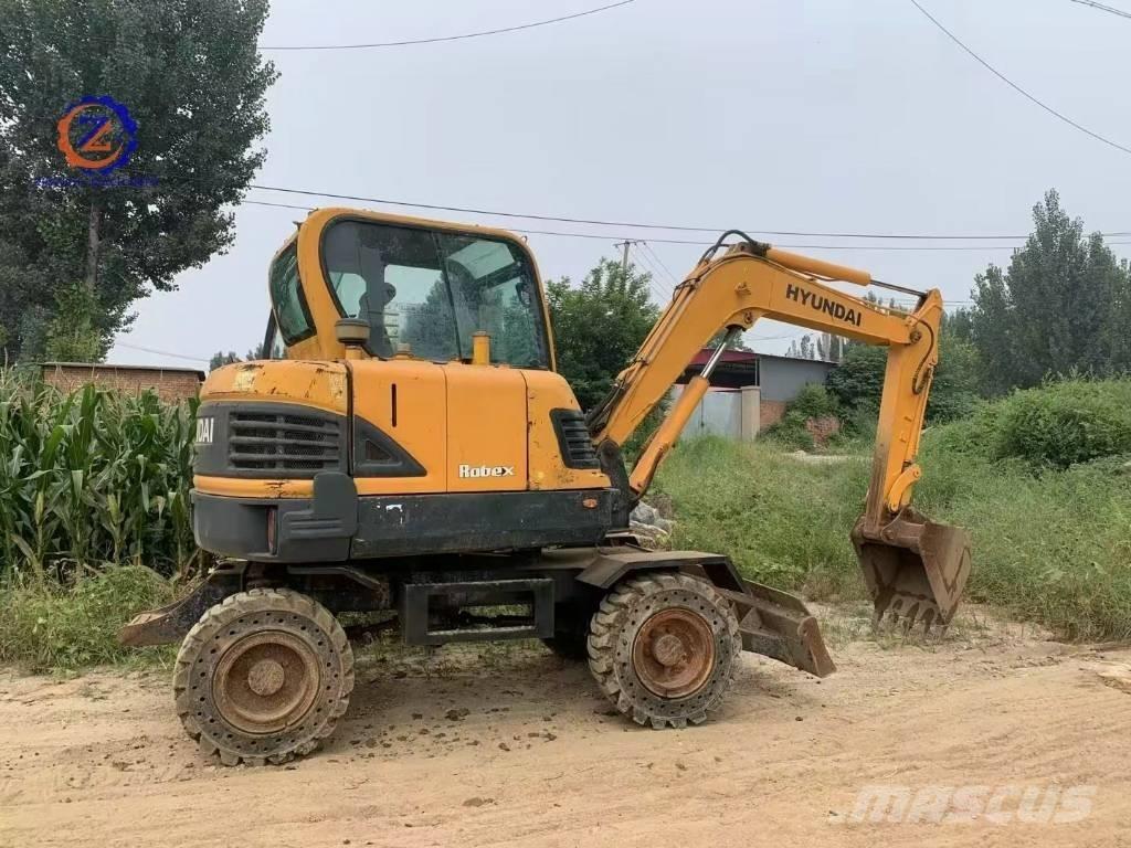 Hyundai 60 W حفارات بعجل