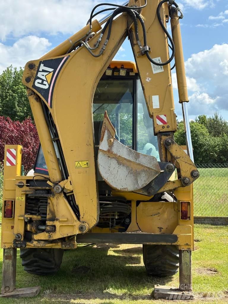 CAT 428 D 4x4 لوادر ذات جرافات عكسية