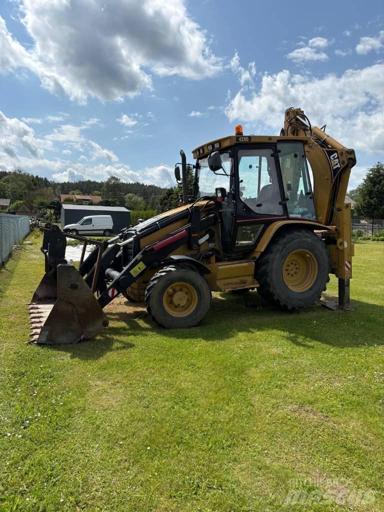 CAT 428 D 4x4 لوادر ذات جرافات عكسية