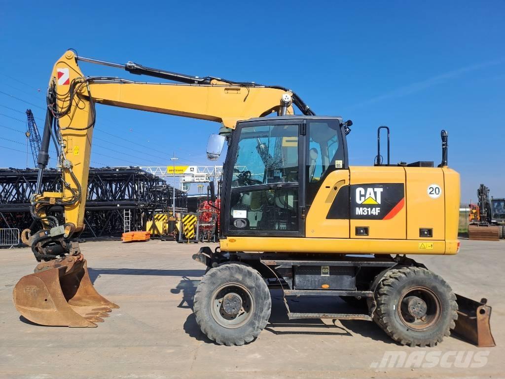 CAT M134F حفارات بعجل