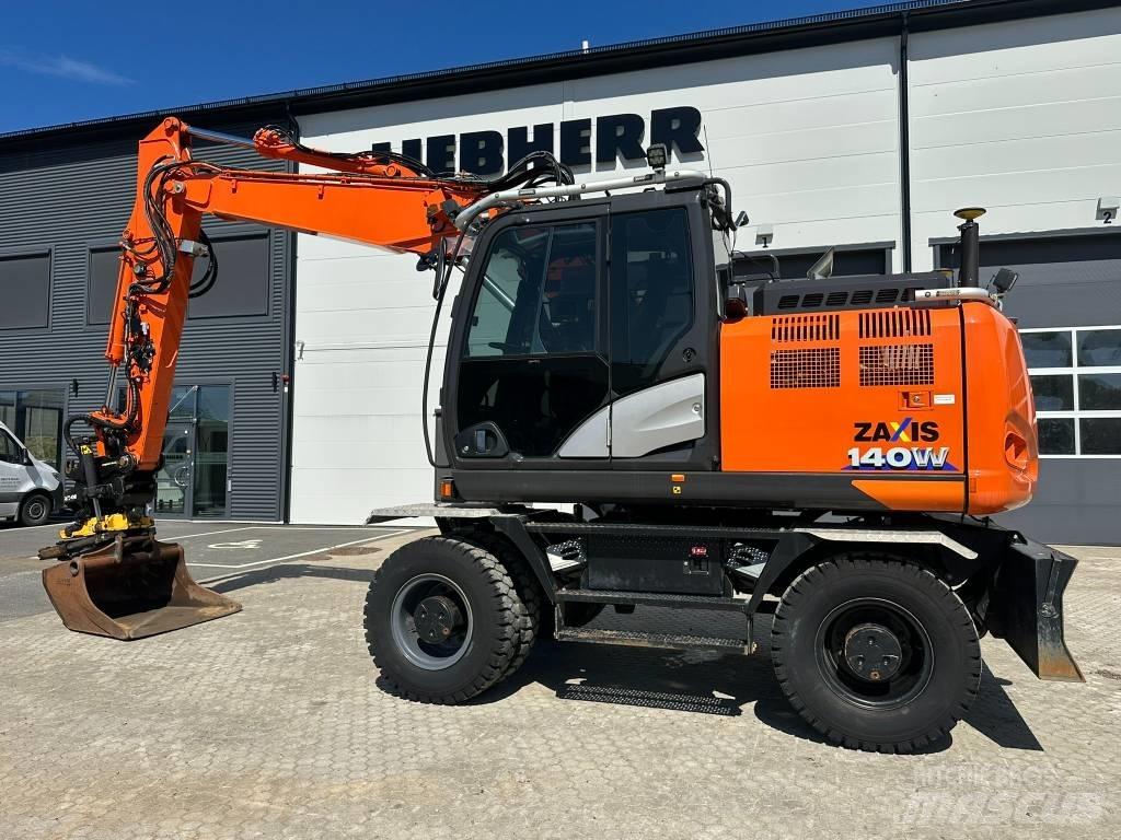 Hitachi ZX 140 W-6 حفارات بعجل