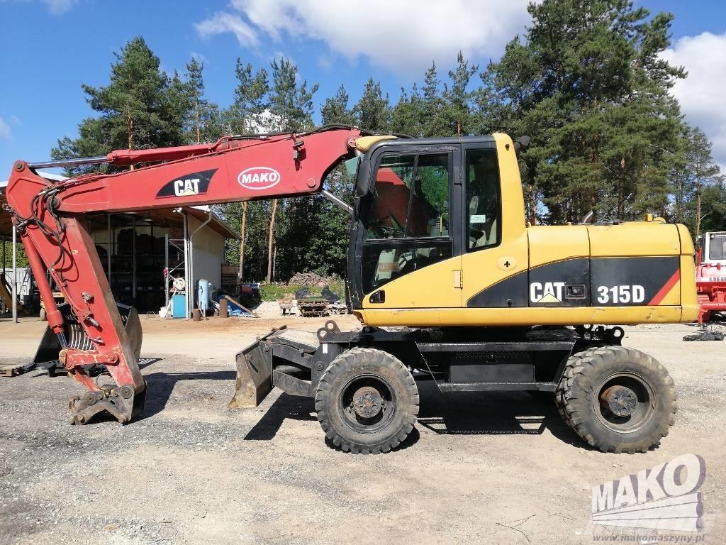 CAT M 315 C حفارات بعجل