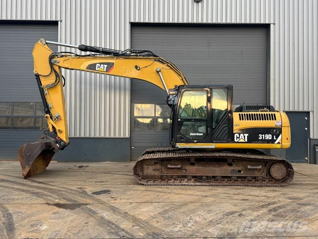 CAT 319DL حفارات زحافة