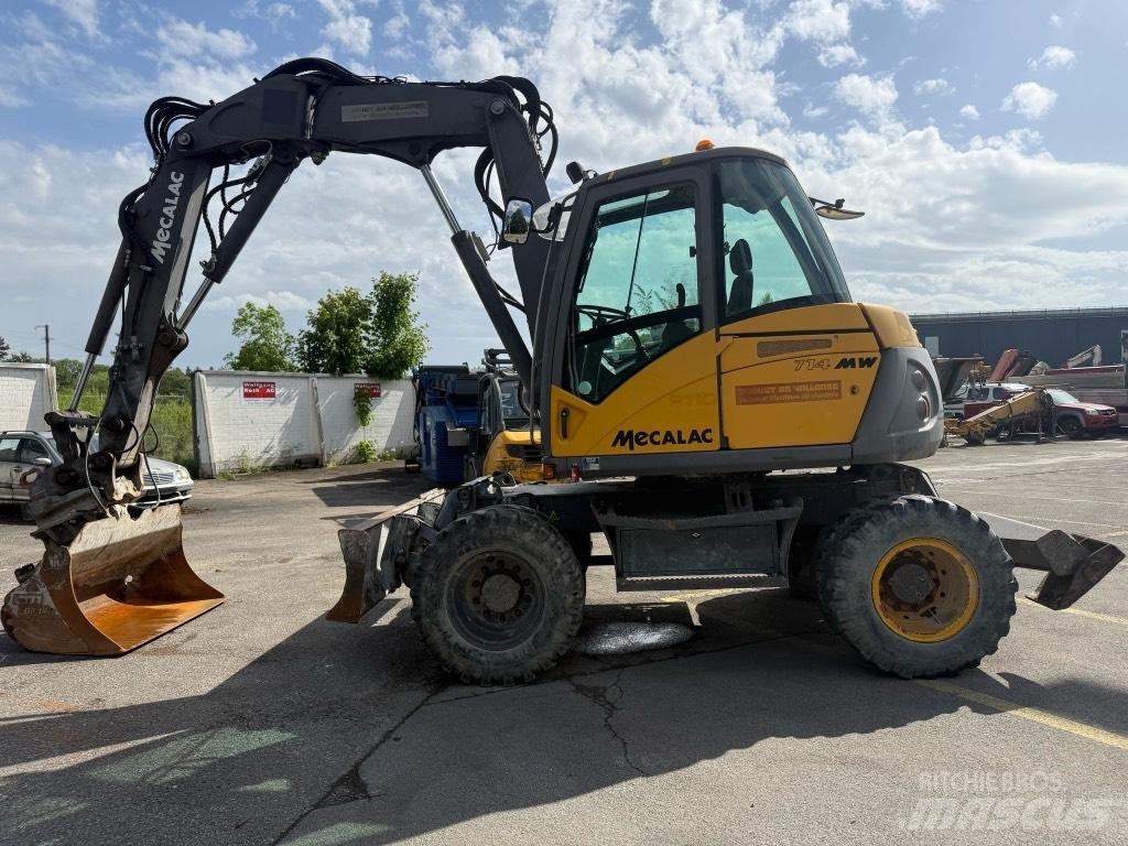 Mecalac 714 MW حفارات بعجل