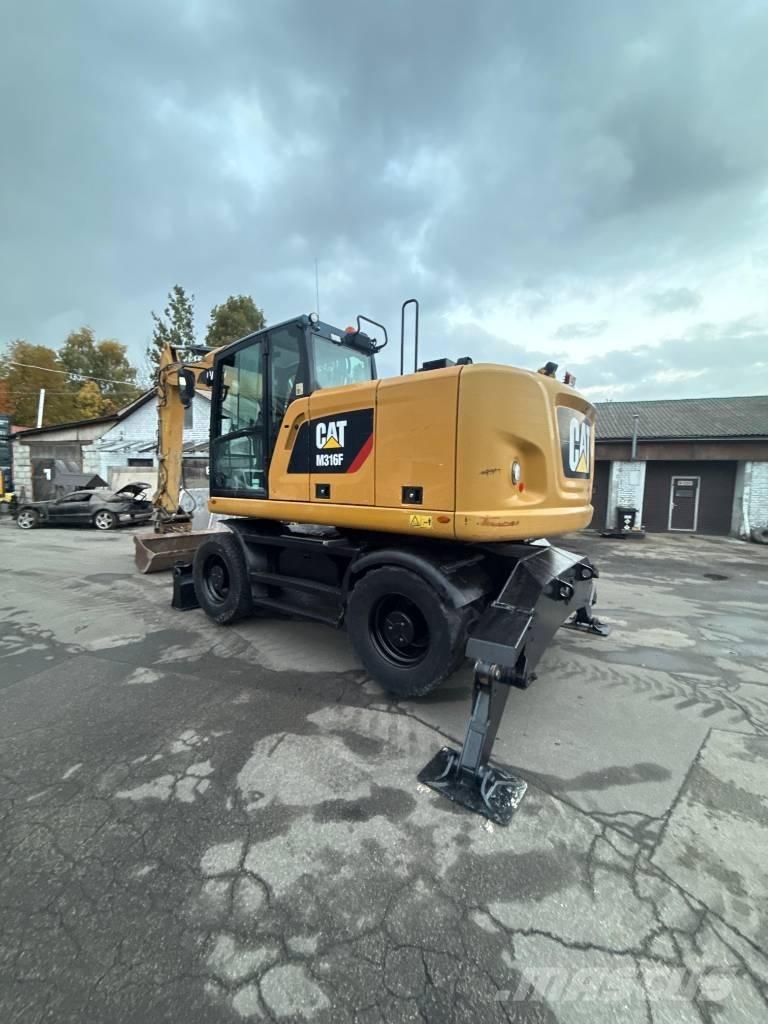 CAT M 316 F حفارات بعجل