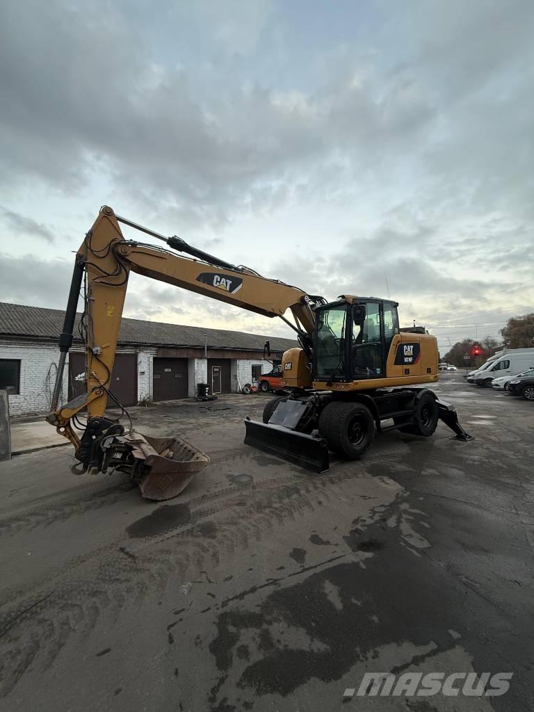 CAT M 316 F حفارات بعجل