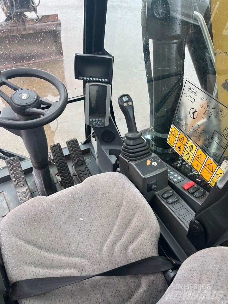 CAT M 316 F حفارات بعجل