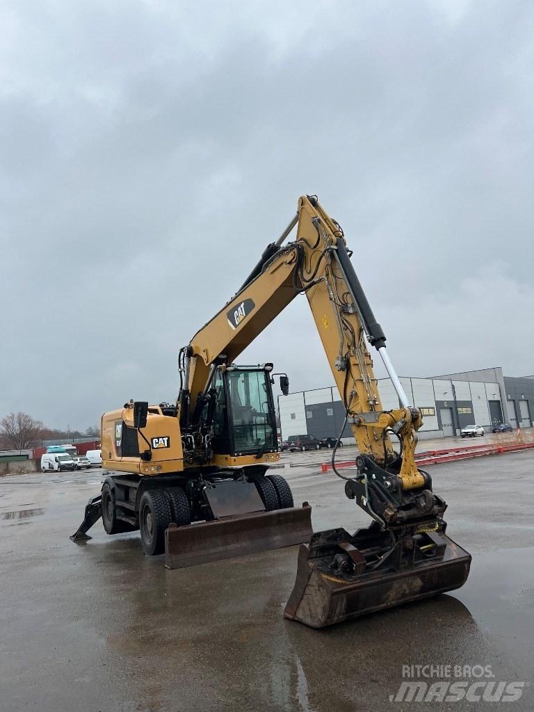 CAT M 316 F حفارات بعجل