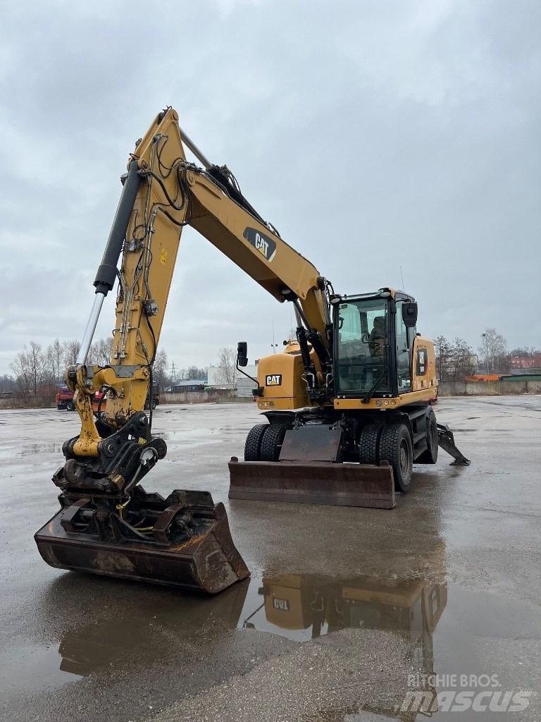 CAT M 316 F حفارات بعجل