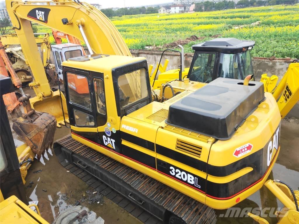 CAT 320B حفارات زحافة