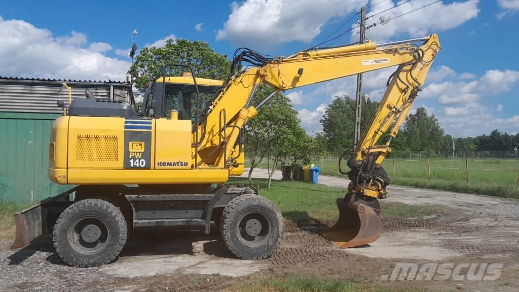 Komatsu PW 140-7 حفارات بعجل