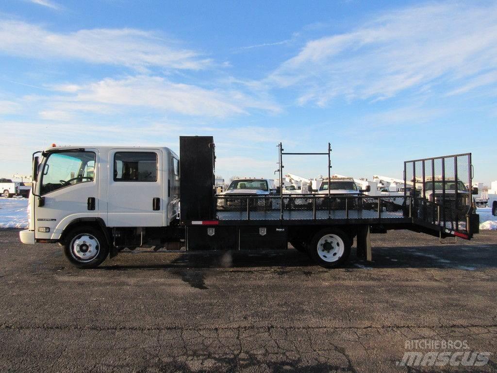 Isuzu NPR HD شاحنات مسطحة/مفصلية الجوانب