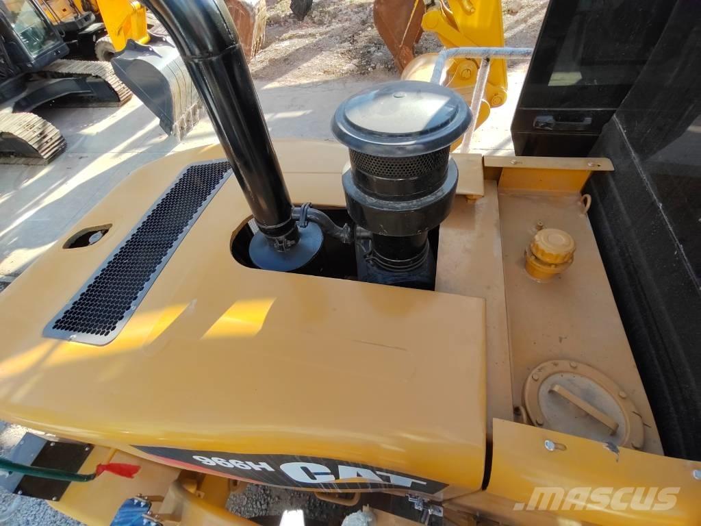 CAT 966 H لوادر بعجل