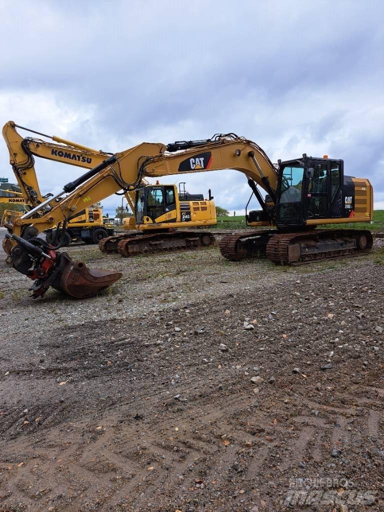 CAT 318 E L حفارات زحافة