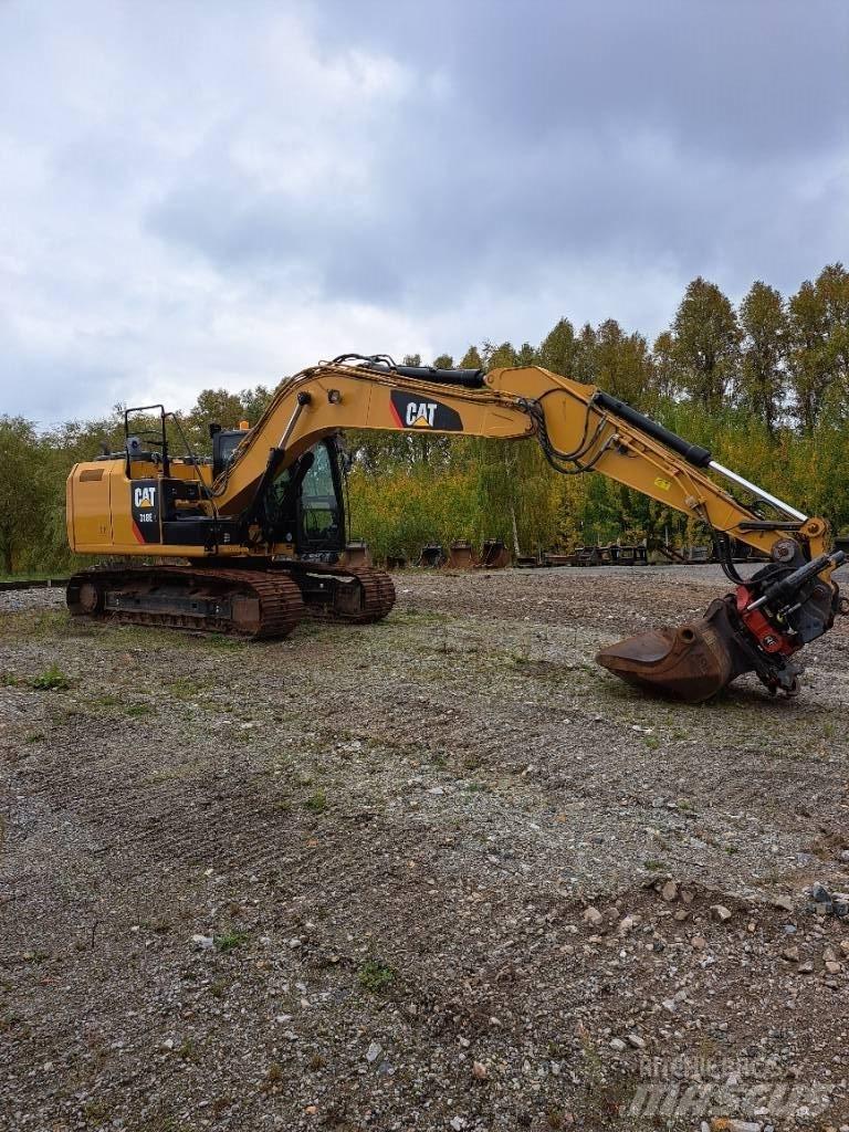 CAT 318 E L حفارات زحافة