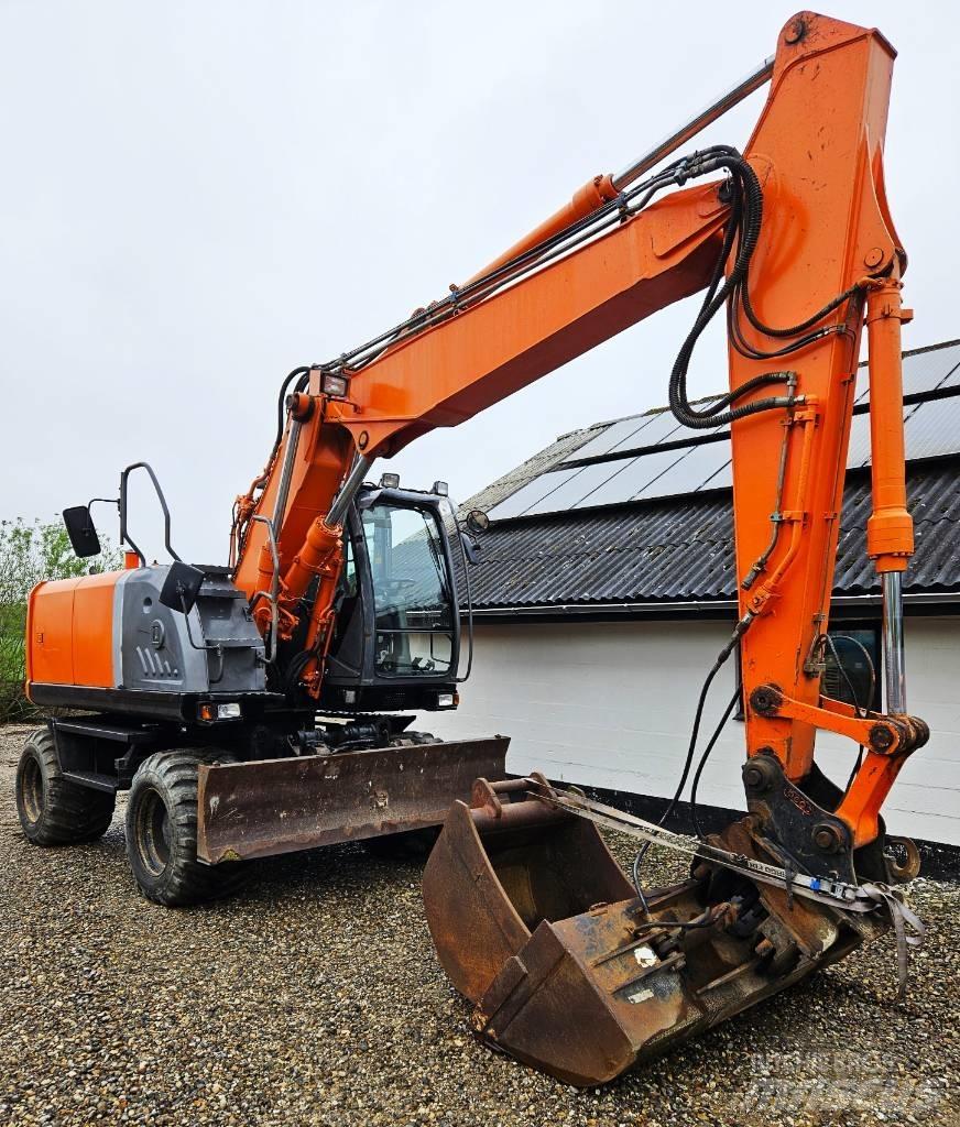 Hitachi ZX 140 W-3 حفارات بعجل