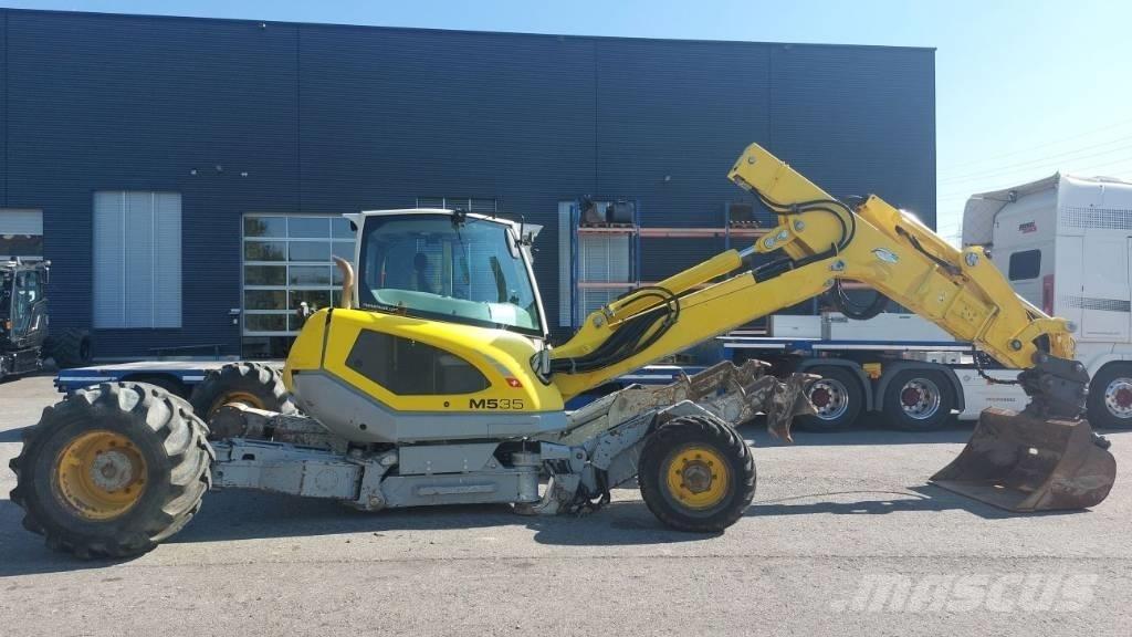 Menzi Muck M535 حفارات بعجل