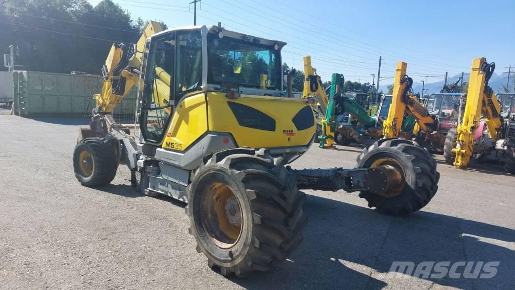 Menzi Muck M535 حفارات بعجل