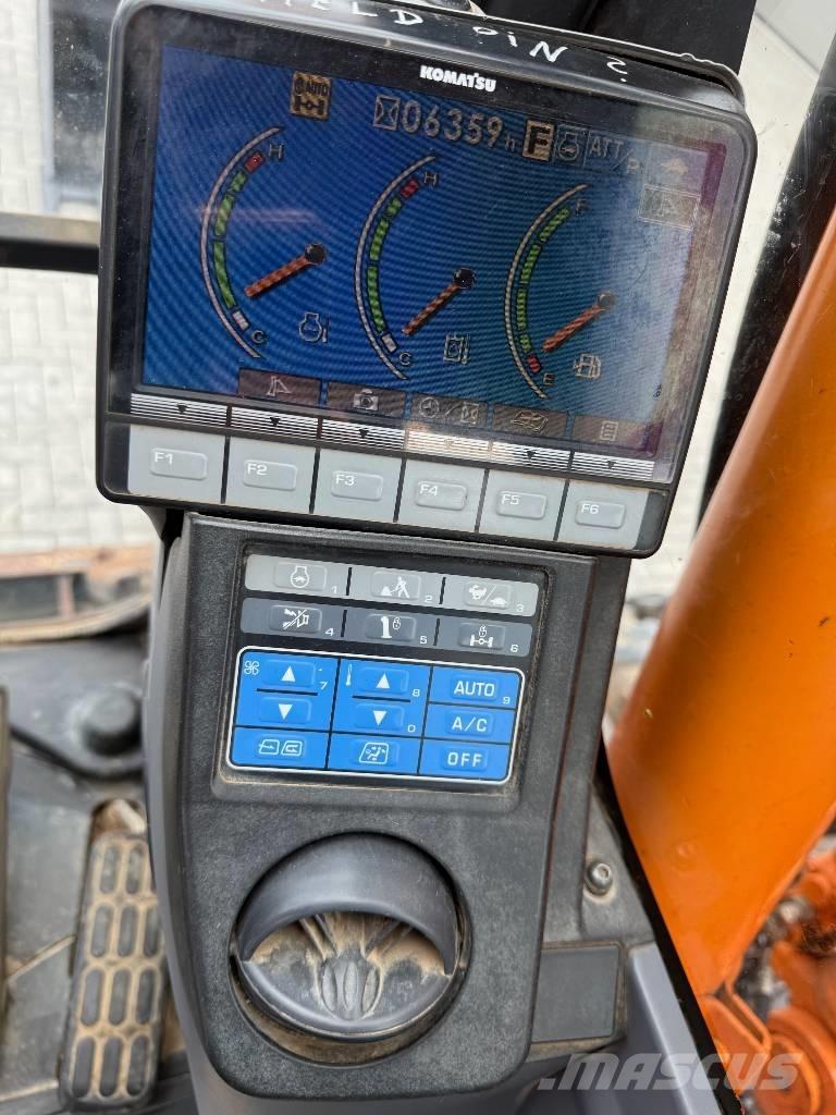 Komatsu PW 148-8 حفارات بعجل