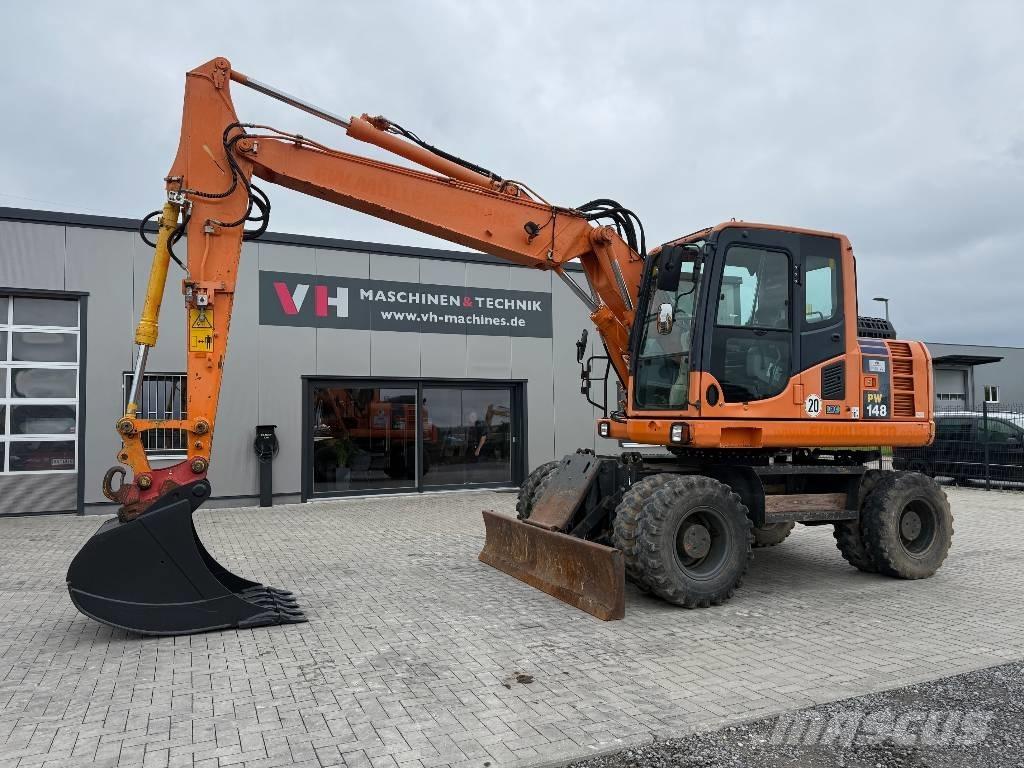 Komatsu PW 148-8 حفارات بعجل