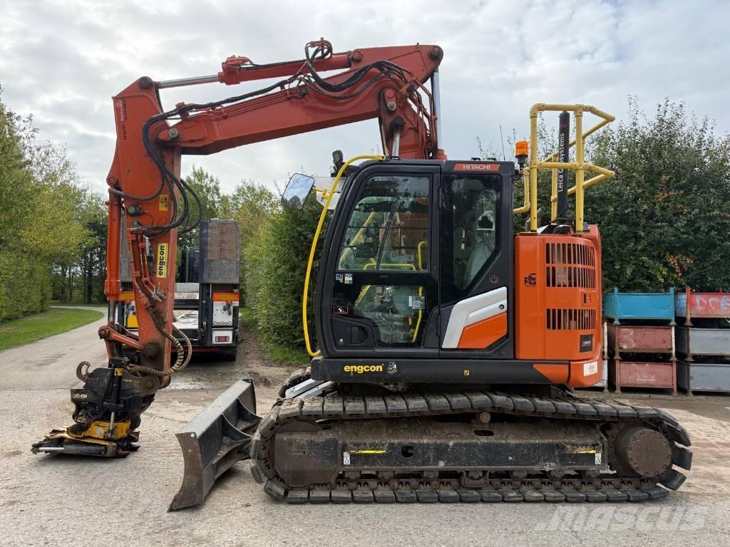 Hitachi ZX 135 US-7 حفارات زحافة
