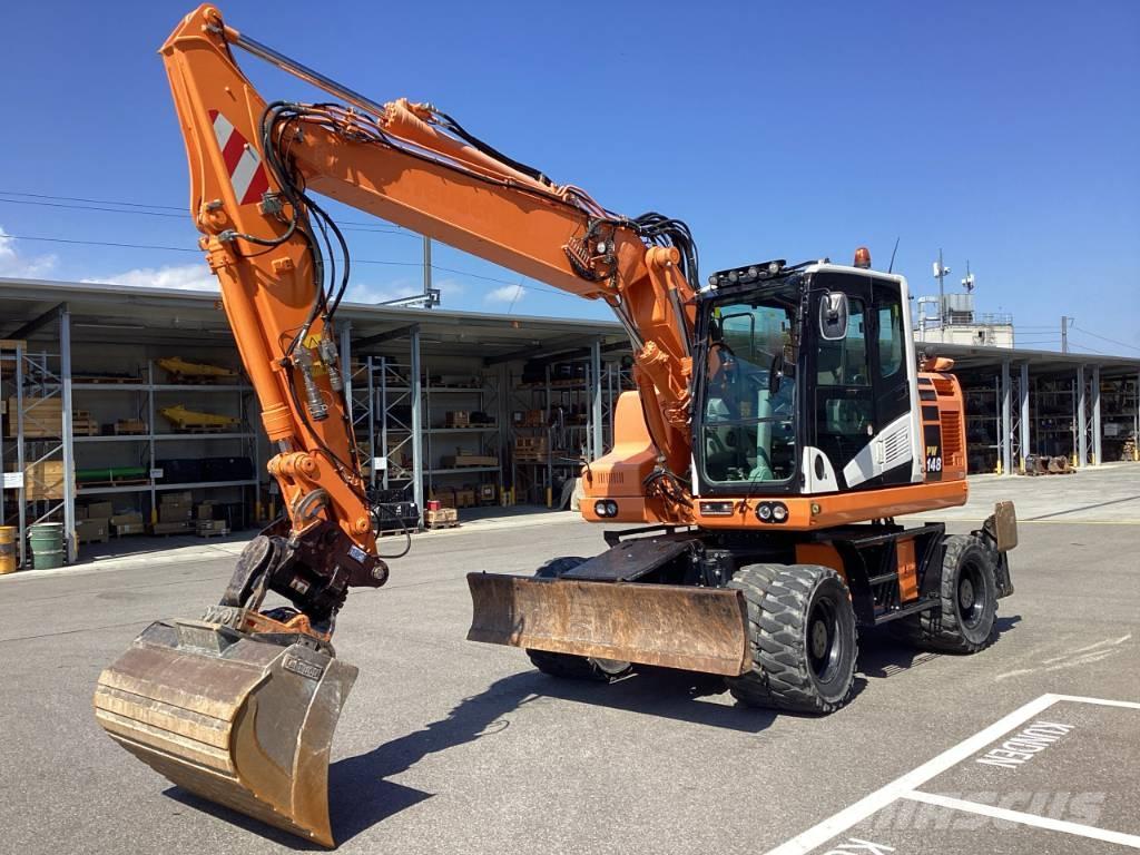 Komatsu PW 148-11 حفارات بعجل