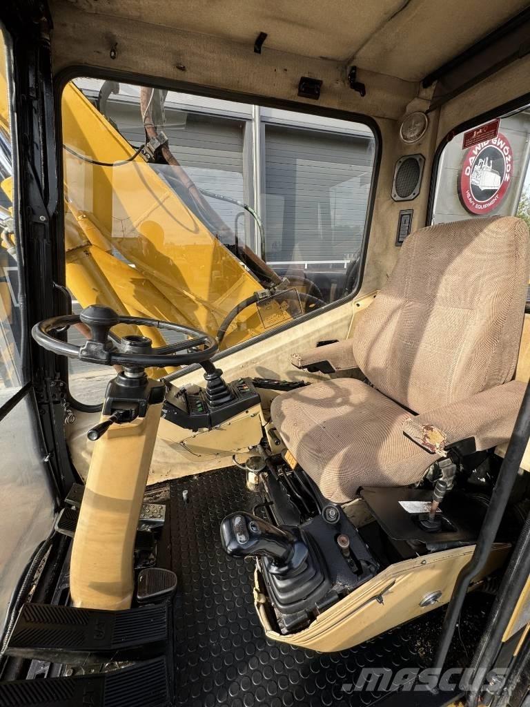 CAT M 315 حفارات بعجل