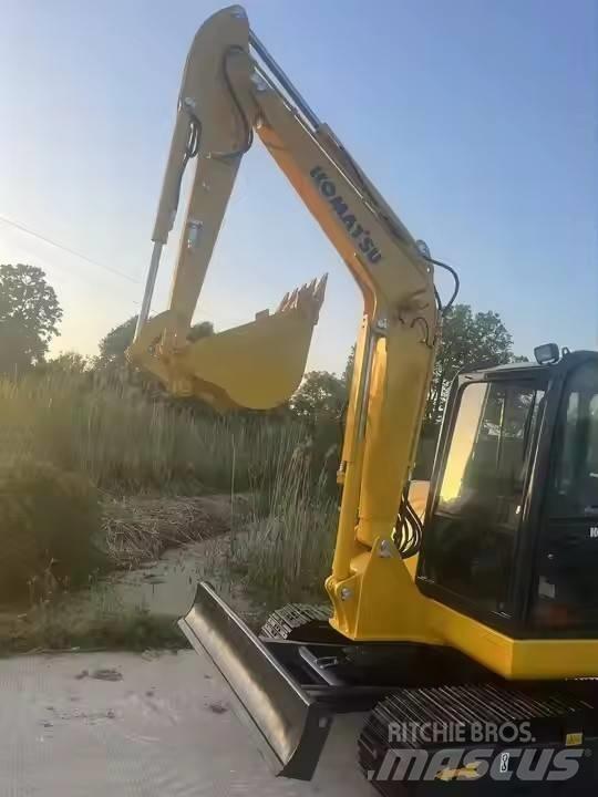 Komatsu PC 56-7 حفارات زحافة