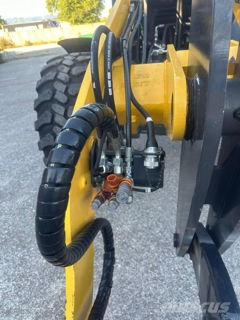 New Holland W 80 C لوادر بعجل